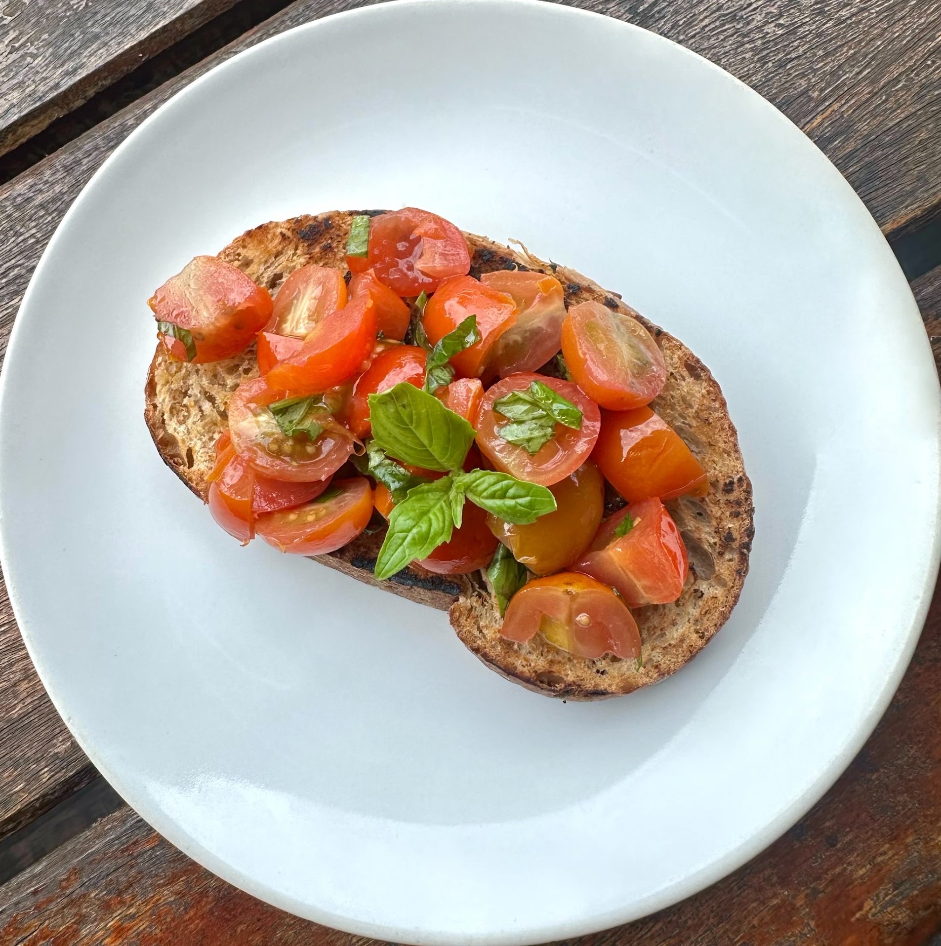 Bruschetta al pomodoro with cherry tomatoes and basil