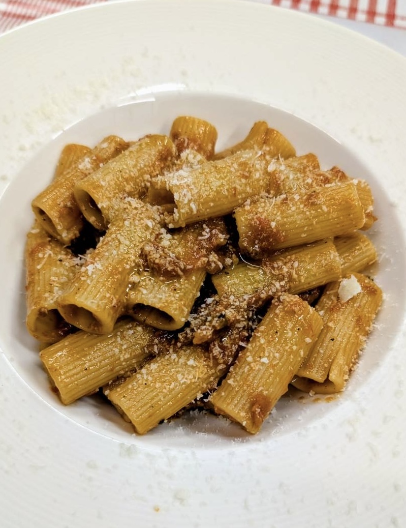 Pasta with slow-cooked ragù and Parmigiano